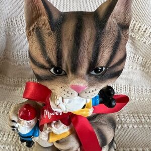 Whimsical Cat Figurine with Red Ribbon